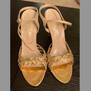 L. G. Haig Gold Heels